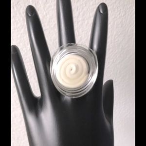 Hand made funky ADJUSTABLE ring.  White polymer clay silver wire soaked in resin